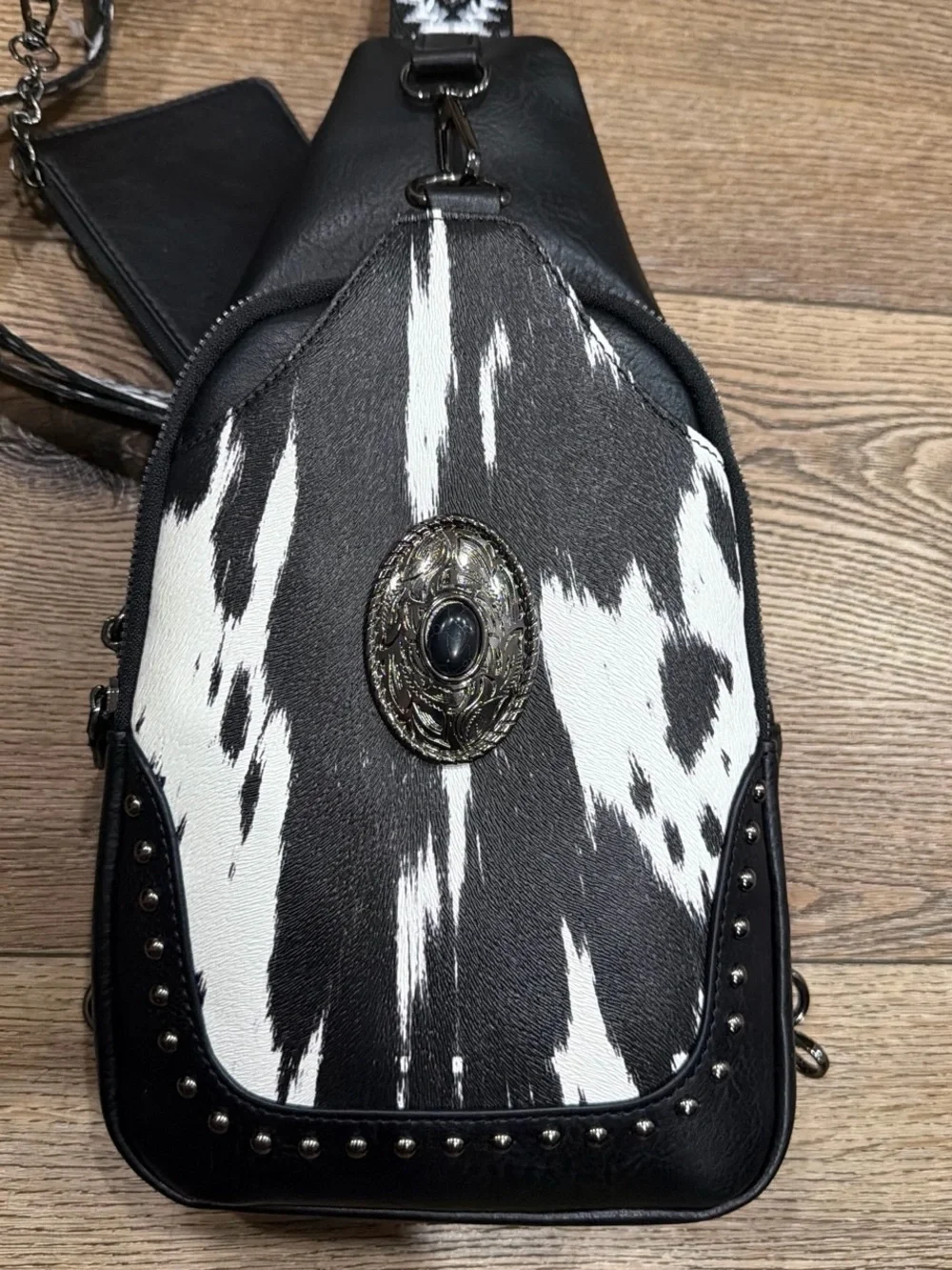 Black & White Cowhide Crossbody Sling Bag with Concho Accent